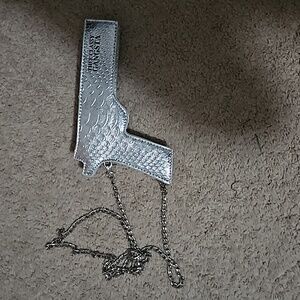 Gun shaped Crossbody lipstick bag, clutch.